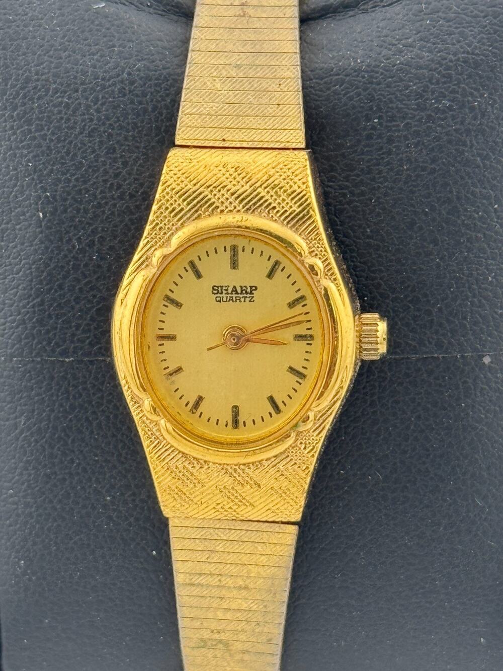 Sharp Quartz Ladies Watch Gold-Tone Oval Case Integrated Crosshatch Textured